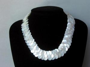 Material 100% Natural White MOP shell Size Numerous small thin shells Length 17 inches Clasp Standard Clasp 35